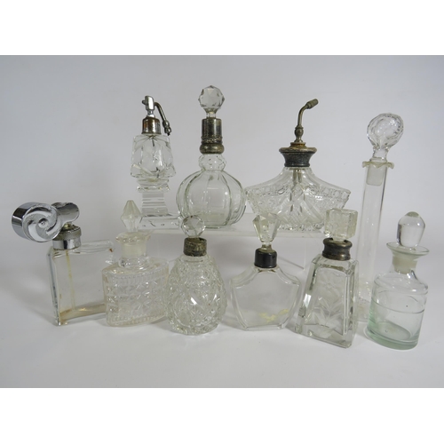 330 - 10 Vintage glass scent bottles some with sterling siver collars.