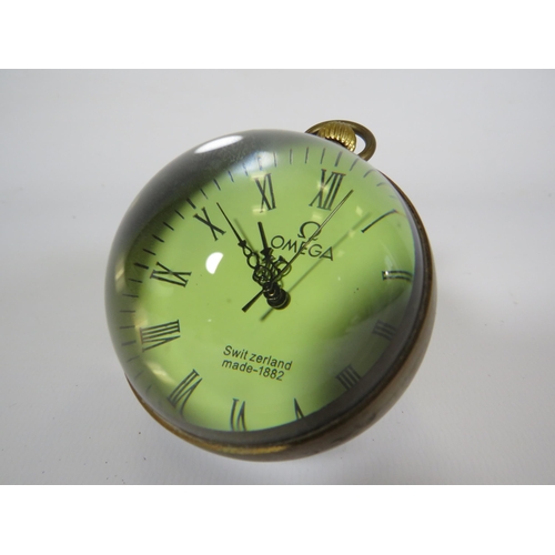 653 - Pocket watch globe paperweight in working condition.