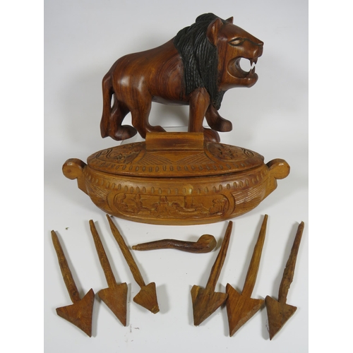 659 - Heavy carved wooden Lion and a carved lidded pot etc.