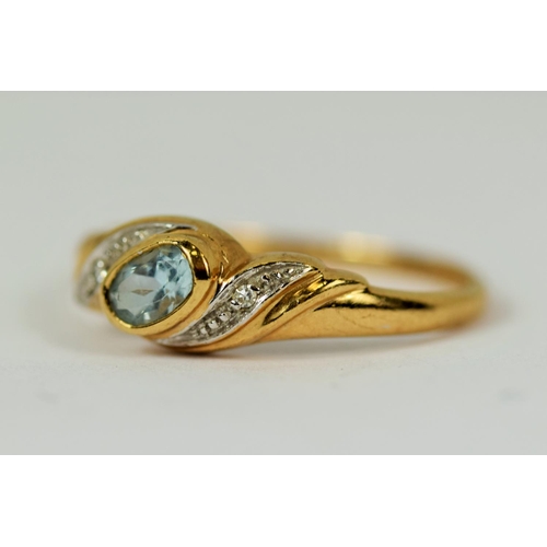 9ct Ring set with a Central Aqua with Multi Diamond set waves to each ...