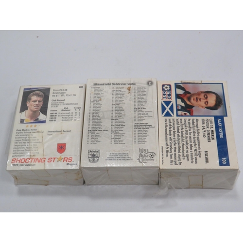 938 - 3 unopened set of vintage football cards.