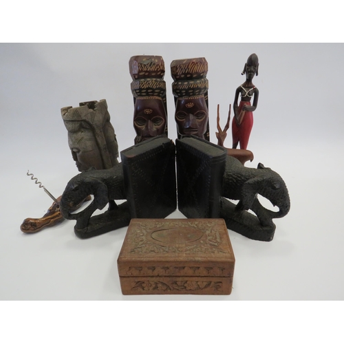 1389 - Selection of carved wooden figurines and a pair of elephant bookends.