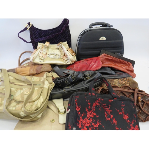 1430 - Selection of ladies handbags and a travel vanity case.