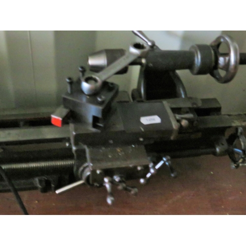 1656 - Smaller hobby lathe with electric motor. PLEASE NOTE, THESE ITEMS ARE VERY HEAVY, THEY WILL NEED TO ... 