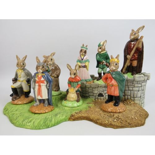 17 - Royal Doulton Bunnykins The Robin Hood collection 8 figurines and base. No boxes for figurines but t... 
