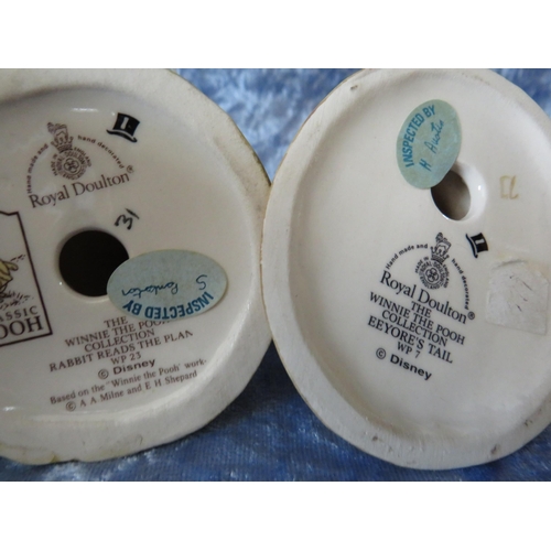87 - 4 Royal Doulton Winnie the Pooh figurines.