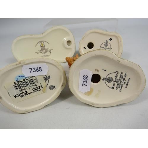 90 - 4 Royal Doulton Winnie the Pooh figurines.