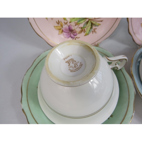 251 - 2 Foley china E Brain cabinet cups and saucers plus 2 spare saucers.