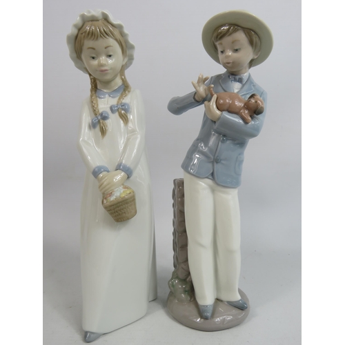 252 - 2 Nao figurines, Boy with a puppy and girl with basket. Approx 10