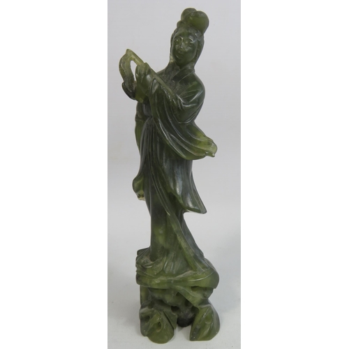28 - Vintage Chinese carved Jade figurine of a flute player approx 21cm tall.