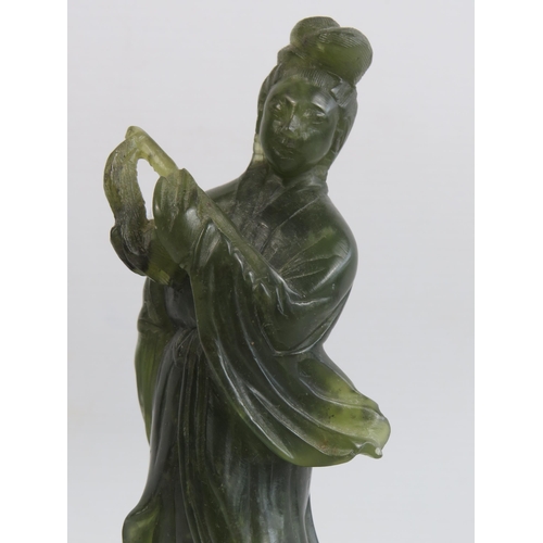 28 - Vintage Chinese carved Jade figurine of a flute player approx 21cm tall.