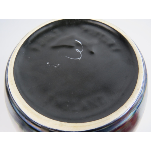 32 - Poole pottery vase in the Galaxy lustre pattern 20cm tall.