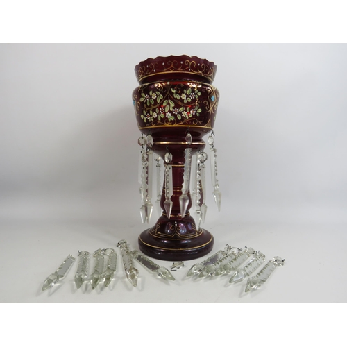 35 - Large Victorian ruby glass lustre with hand painted decoration and a spare set of glass droplets.