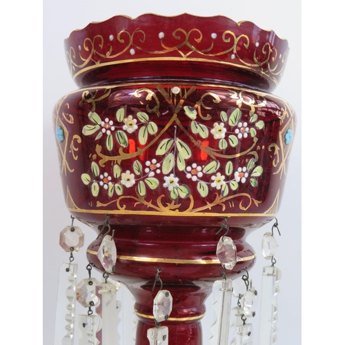 35 - Large Victorian ruby glass lustre with hand painted decoration and a spare set of glass droplets.