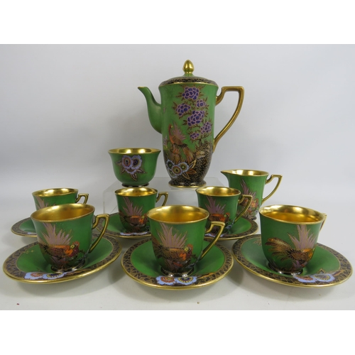 47 - Rare Royal Crown Devon lustre and enamel coffee set. (small chip to base of coffee pot and 1 cup)