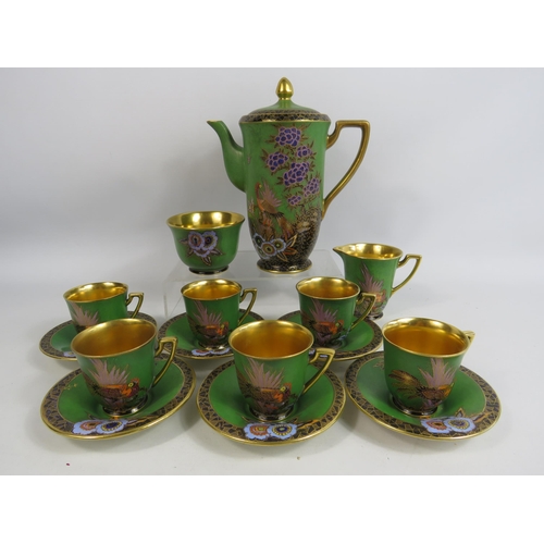 47 - Rare Royal Crown Devon lustre and enamel coffee set. (small chip to base of coffee pot and 1 cup)