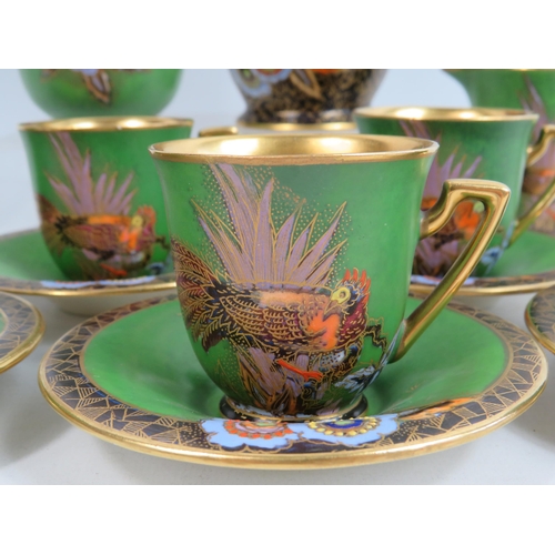 47 - Rare Royal Crown Devon lustre and enamel coffee set. (small chip to base of coffee pot and 1 cup)
