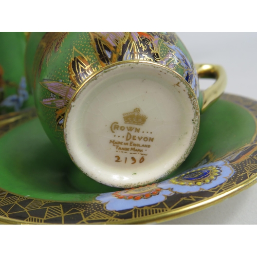 47 - Rare Royal Crown Devon lustre and enamel coffee set. (small chip to base of coffee pot and 1 cup)