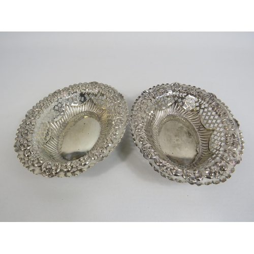 285 - 2 Birmingham 1897 sterling silver reticulated and embossed bon bon dishes, 74 grams.
