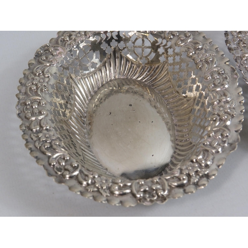 285 - 2 Birmingham 1897 sterling silver reticulated and embossed bon bon dishes, 74 grams.