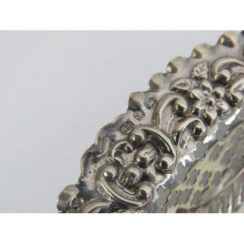 285 - 2 Birmingham 1897 sterling silver reticulated and embossed bon bon dishes, 74 grams.
