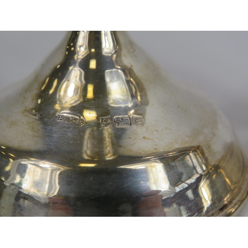 287 - Pair of sterling silver weighted candlesticks 5 1/4