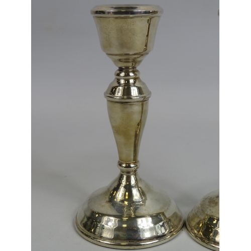 287 - Pair of sterling silver weighted candlesticks 5 1/4