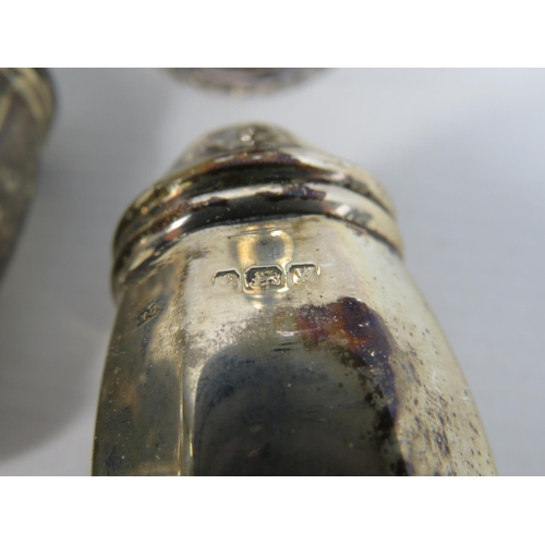 295 - Birmingham sterling silver Salt and pepper pot and a Sheffield pepper pot, total weight 69.6 grams.