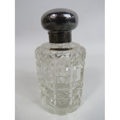 296 - Birmingham sterling silver 1913 silver topped glass scent bottle.