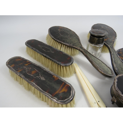 298 - Walker and Hall Sheffield sterling silver and tortoiseshell vanity dressing table set.