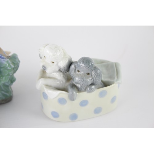 257 - 2 x Assorted NAO Ornaments Inc Girl & Bird, Puppies in a Basket    629146