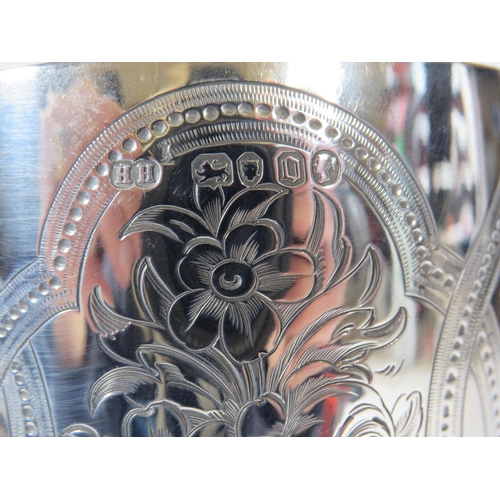 260A - 1869 London sterling silver Henry Holland trophy with lemon gilt interior and 4 shields on the base.... 