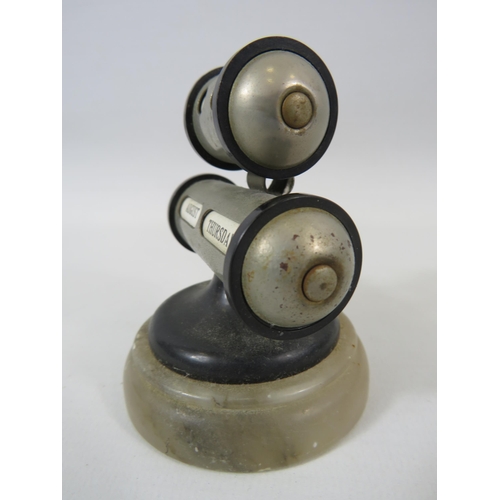 93 - Art deco Bauhaus circular chrome perpetual calender standing on a onyx plinth.