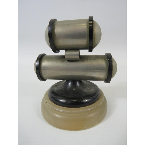 93 - Art deco Bauhaus circular chrome perpetual calender standing on a onyx plinth.