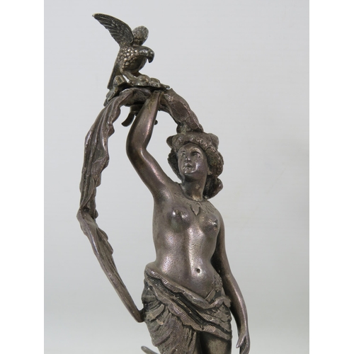 97 - Vintage Spelter statue standing on a silver plated base, approx 10.5