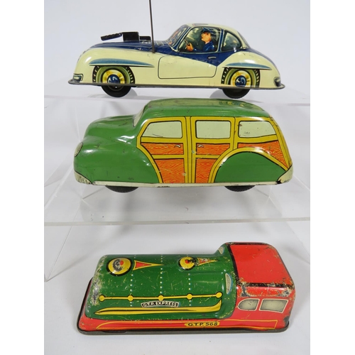 969 - Three British made Tin plate friction motor toy cars and loco.  Fair condition.  See photos.