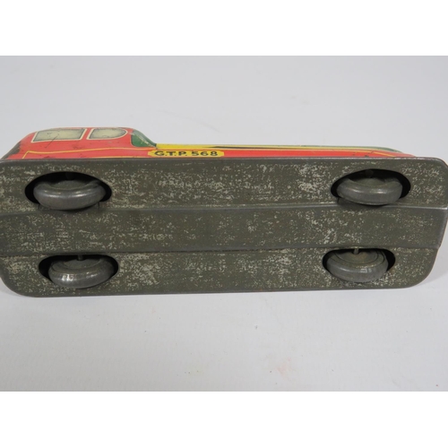 969 - Three British made Tin plate friction motor toy cars and loco.  Fair condition.  See photos.