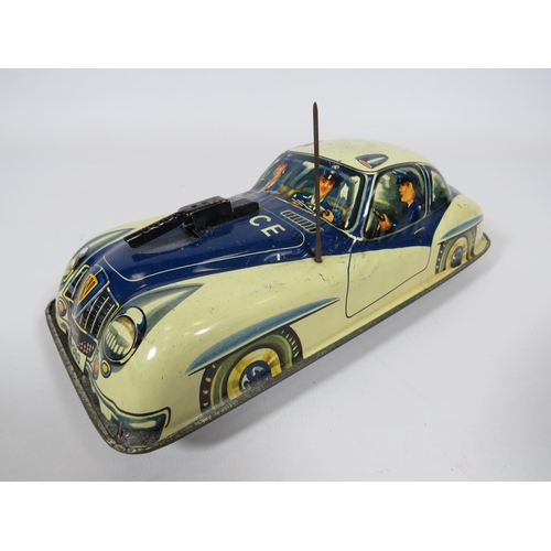 969 - Three British made Tin plate friction motor toy cars and loco.  Fair condition.  See photos.