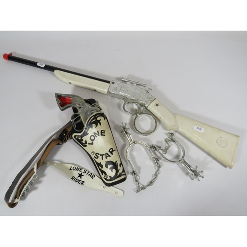 971 - Lone Star Cowboy gun, Holster, Spurs and Rifle.  (one side of gun handle missing.)  See photos.