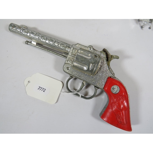 971 - Lone Star Cowboy gun, Holster, Spurs and Rifle.  (one side of gun handle missing.)  See photos.