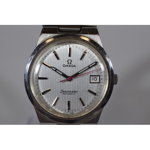 165 - Omega Seamaster Automatic, Date Window, Chrome strap. No box or papers.   Runs well.  See photos.