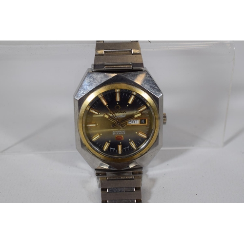 167 - Omax Automatic Crystal with day/date window  25 Jewel, Swiss made. In running order. Watch number 35... 