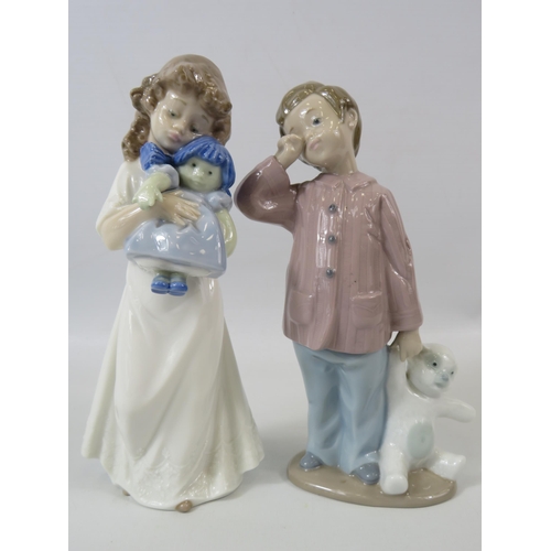 2 - 2 Nao Lladro figurines, a girl with a doll and a boy with a teddy the tallest measures 8