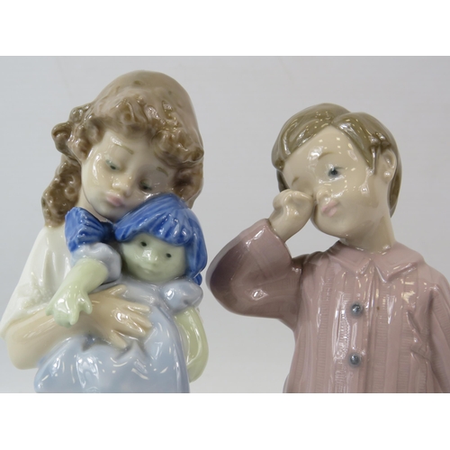 2 - 2 Nao Lladro figurines, a girl with a doll and a boy with a teddy the tallest measures 8