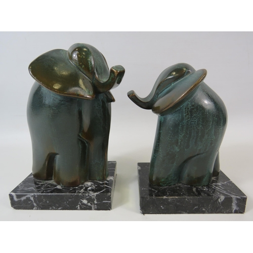 21 - Two S.A PAOR abstract bronze elephant sculptures standing on marble bases. The tallest measures 7