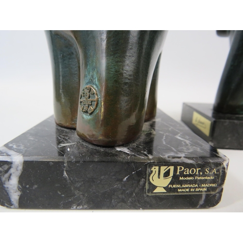 21 - Two S.A PAOR abstract bronze elephant sculptures standing on marble bases. The tallest measures 7