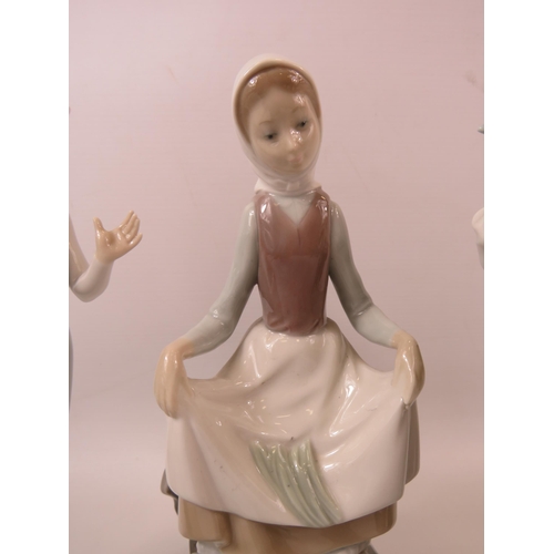 25 - 3 Lladro figurines the tallest measures 9.5