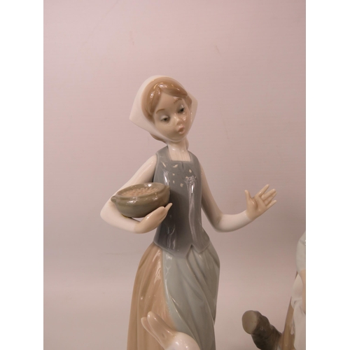 25 - 3 Lladro figurines the tallest measures 9.5