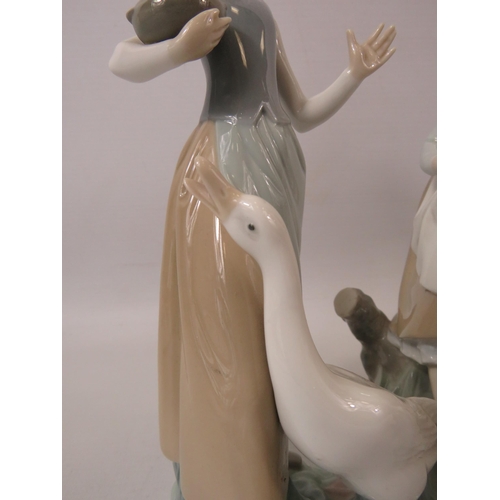 25 - 3 Lladro figurines the tallest measures 9.5