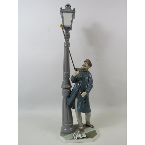 33 - Lladro figurine The Lamp lighter. Approx 18.5